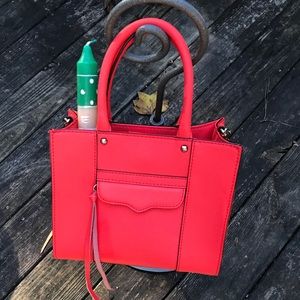 Rebecca Minkoff coral crossbody bag.